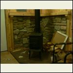 Woodstove installed and trimmed out