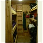 Bunks to the left, pantry storage on the right