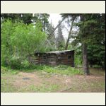 "Nine Mile Bert", an alcoholic, used to live here.  They found him dead in his cabin one spring.