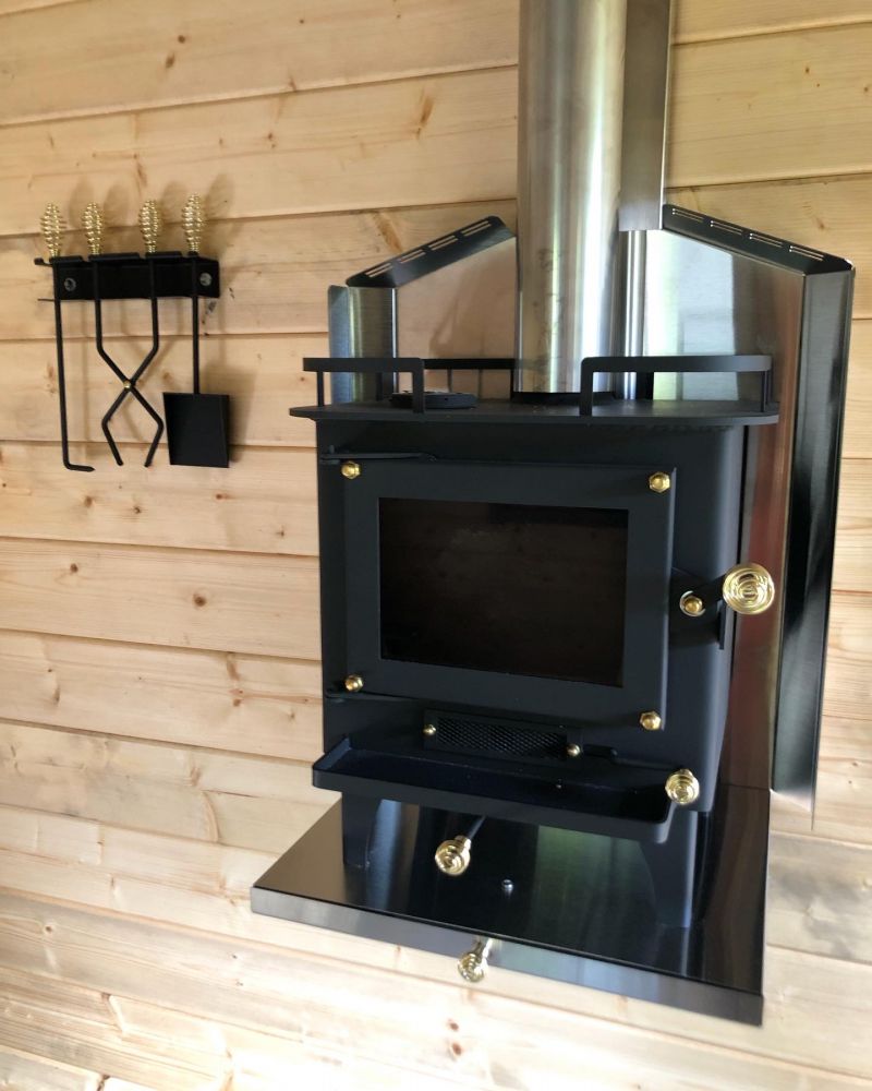 A Tiny Wood Stove Is the Cozy-Glow Heater Your Cabin Needs - Sunset