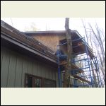 dormer and remove jacks from roof finally and prime over hang on porch roof