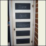 doorway under the stairs-I used blackboard paint for middles...Silver Creek Hideaway is what we call