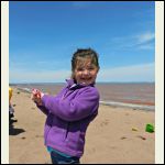 granddaughter, Morgan, flying a kite