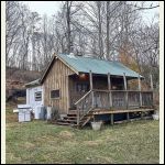 Cabin when I bought it, you can see the porch roof doesn't extend to top of posts