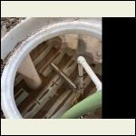 Mud in the cistern from a plumbing leak