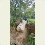 Re-burying the cistern (deeper hole this time)