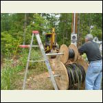 Rolls of cable on ladders