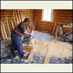 Ramil, our carpenter making window trim.  He like to use his router