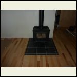 wood stove with tile base