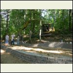 Retaining wall with inspector