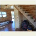 stairs are in with a pantry underneath