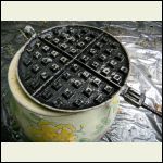 Waffle iron opened