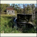 old car and house