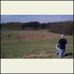 Overview of land with son and grandson Overview of land with son and grandson