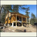 Windows in, siding underway Windows in, siding underway
