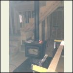 terrible pic of woodstove, getting dark at 5 PM