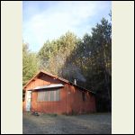 cabin with smoke out of chimney, just installed new stove cabin with smoke out of chimney, just installed new stove