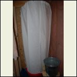 My ingenious shower: upside down umbrella to hang shower curtain, and tub.