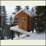 Showerhouse under snow