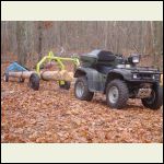 Hauling logs with log arch.