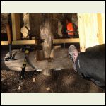 Notching the sill logs to set beam in place Notching the sill logs to set beam in place