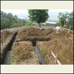 Day 3 - digging foundation trenches and putting in 10 cm concrete base.