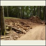 Dirt and rock pile getting smaller Dirt and rock pile getting smaller