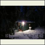 Cabin in winter, at night