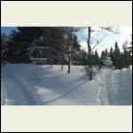 buried camp sign in driveway