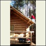 Piotr trimming the roof membrane