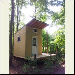 All the siding on, decks built and the windows and doors installed