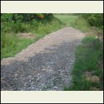 pipe installed with a ditch cut on up side to move water to culvert