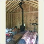 inside in progress ceiling will be red cedar tongue and groove walls will be 1/4 log red cedar inside in progress ceiling will be red cedar tongue and groove walls will be 1/4 log red cedar