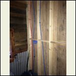 1/2 in Pex running thru bedroom wall to sink and toilet