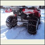 ATV with Chains to Fight the Snow