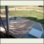 Forward hatch and hardwood decking.