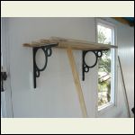 Slats attached to bracket , checking for fit on the wall Slats attached to bracket , checking for fit on the wall