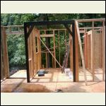 bathroom framed, and arch way to kitchen area