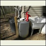 Freeze friendly pitcher pump on rain barrel Freeze friendly pitcher pump on rain barrel