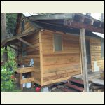 New siding on bunkhouse and outdoor sink