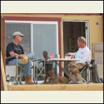 relaxing on temporary front porch, me on right