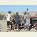 the crew discussing our neighbor's 3 wheel bike