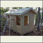 Roof sheathing on, eave drip edge in place