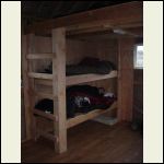 Bunkbed with ladder to the loft.