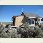 Framed with sheathing & metal roof.