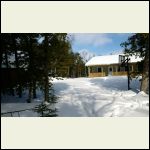 The Bunkie (left) and new cabin