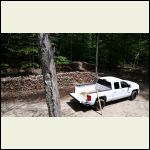 View from roof to wood pile