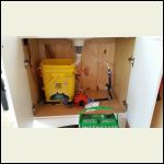 Under sink pump and plumbing Under sink pump and plumbing