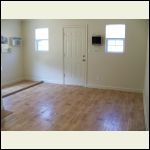 Installation of flooring in den & kitchen