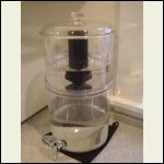 Berkey water filter recycling old filters in smaller container. Berkey water filter recycling old filters in smaller container.